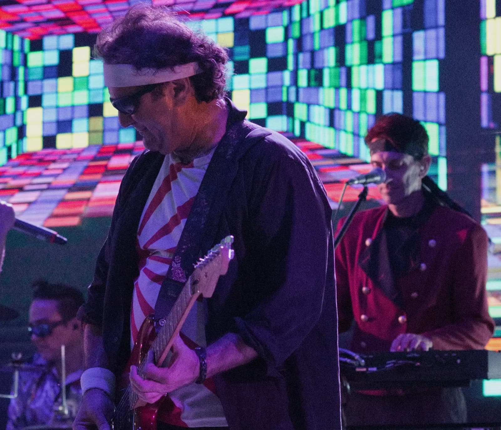Notorious guitarist in front of an LED video wall