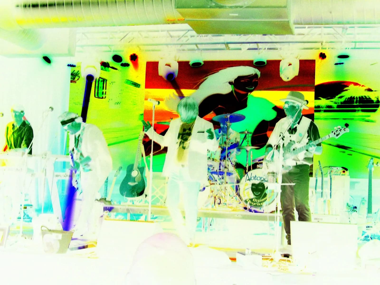 Notorious performing live with a vivid colorized stage backdrop